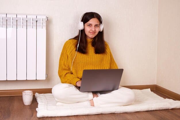 A young woman sitting at a desk in her bedroom, engrossed in an online course on her laptop. She is taking notes in a notebook and appears focused and determined. Sunlight streams in through the window, creating a warm and encouraging atmosphere.