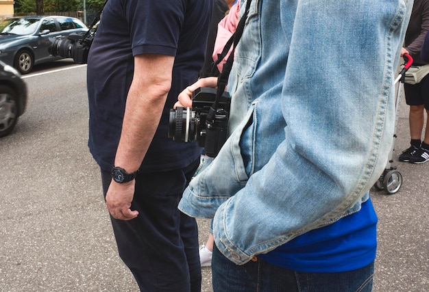 A police officer shaking hands with a community member at a neighborhood event. The image should convey a sense of trust and cooperation between law enforcement and the community.