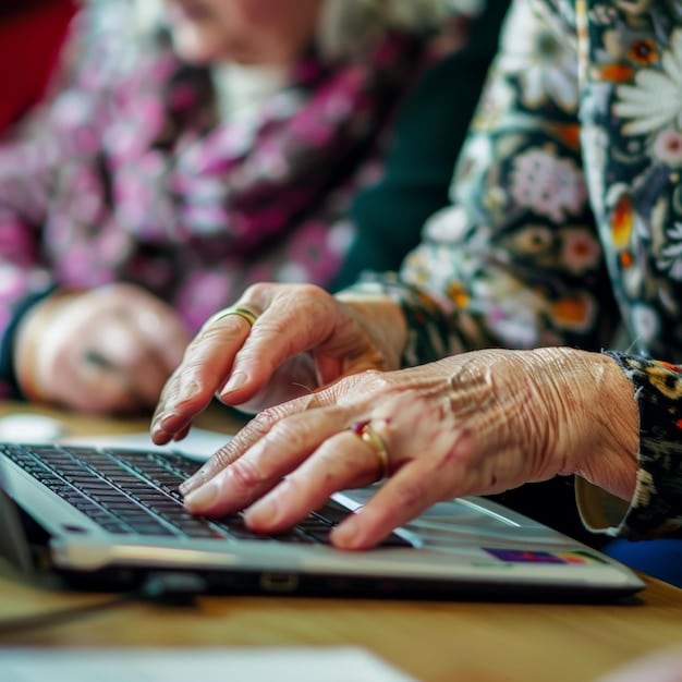 A close-up shot of a librarian's hands gently guiding a senior's hands on a computer keyboard, demonstrating a specific typing technique. The focus is on the hands and the keyboard, highlighting the personal and supportive nature of the instruction.