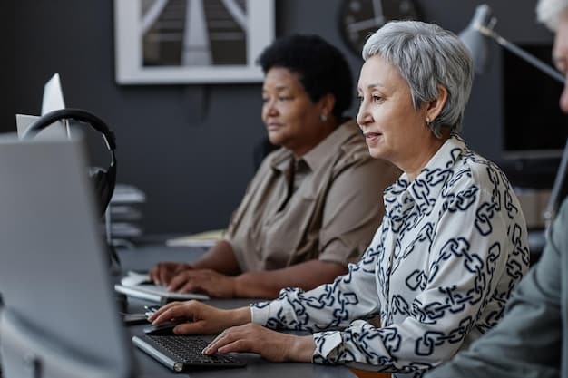 A group of diverse entrepreneurs collaboratively working on laptops during a workshop, with the retired accountant circulating to offer personalized guidance.