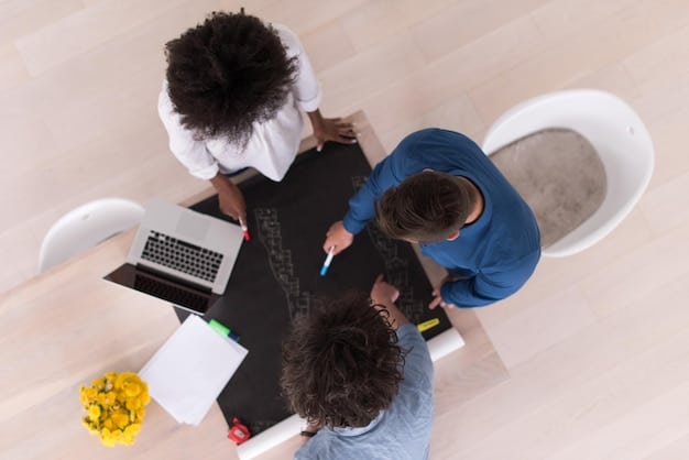 A high angle shot of a group of diverse people working together on a project. They are looking at a blueprint and discussing ideas. The scene is dynamic and collaborative, with each person actively contributing to the conversation. The setting is a modern office space with large windows and natural light.
