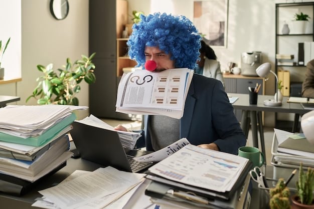 A close-up of a stressed individual with their head in their hands at their desk, surrounded by piles of paperwork and a computer screen displaying multiple notifications.