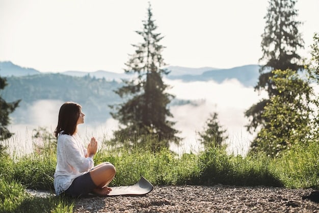 A person practicing yoga outdoors in a serene setting, with trees and a clear sky in the background. They are focused and calm, exemplifying the benefits of mindfulness and self-care.