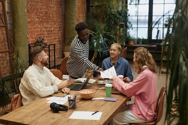 A group of people sitting around a table, participating in a community meeting. They are diverse in age, race, and gender. One person is speaking while others are listening attentively and taking notes. The atmosphere is collaborative and engaged.