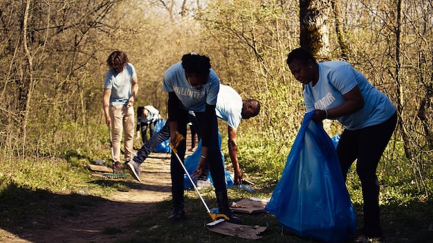 A diverse group of volunteers participating in a community cleanup event, emphasizing their joint effort in improving the local environment and fostering community pride.