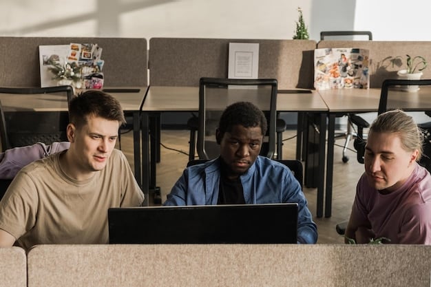 A diverse group of students in a community college classroom, working on computers and engaging in a hands-on coding or software development project. The instructor is guiding them, and the atmosphere is interactive and collaborative.