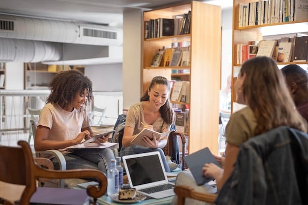 A community college student, working on a laptop in a well-lit, modern library or study area. She is surrounded by books and resources, highlighting accessibility and a conducive learning environment.