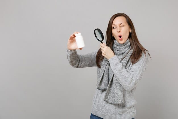 A person carefully reading the label of a skincare product, focusing on the ingredient list, with a magnifying glass hovering over the label.