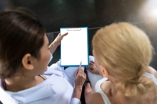 A patient in a consultation with a plastic surgeon, reviewing before and after photos on a tablet. The surgeon is pointing to the photos, explaining the expected results of a neck lift procedure.