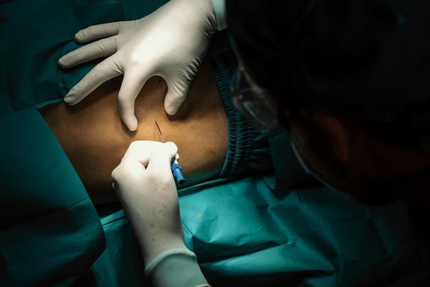 A close-up shot of a surgeon using a VASER liposuction device on a patient's abdomen, showing the small incision and the cannula inserted beneath the skin. The skin is marked with a grid pattern to guide the procedure.