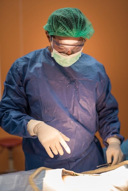 A close-up view of a plastic surgeon's hands marking a male patient's chest with a surgical marker, preparing for gynecomastia surgery and highlighting the surgical planning process.