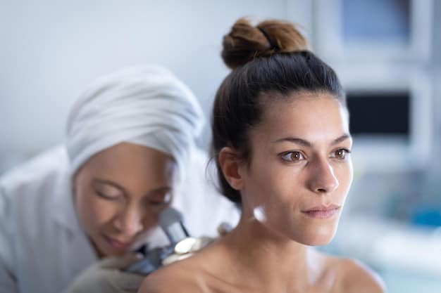 A dermatologist performing laser skin resurfacing on a patient's face. The dermatologist is wearing protective eyewear and using a handheld laser device on the patient's skin. The patient is also wearing protective eyewear and appears relaxed.
