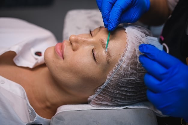 A person receiving a non-surgical brow lift using injectables, with a clear focus on the treated area.