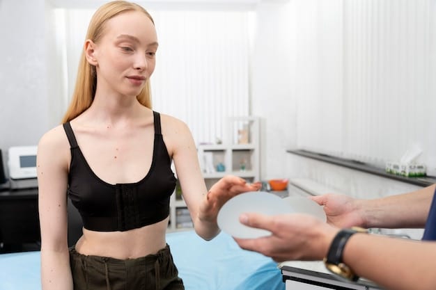 A plastic surgeon and patient discussing implant sizers, with various breast implant sizes displayed on a table, emphasizing informed decision-making.