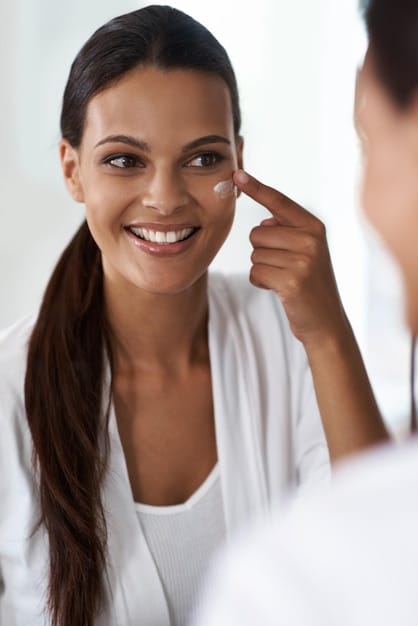 A patient smiling confidently, showcasing a faded, almost invisible scar near their eye, indicating successful scar revision. The lighting is soft, highlighting smooth skin.