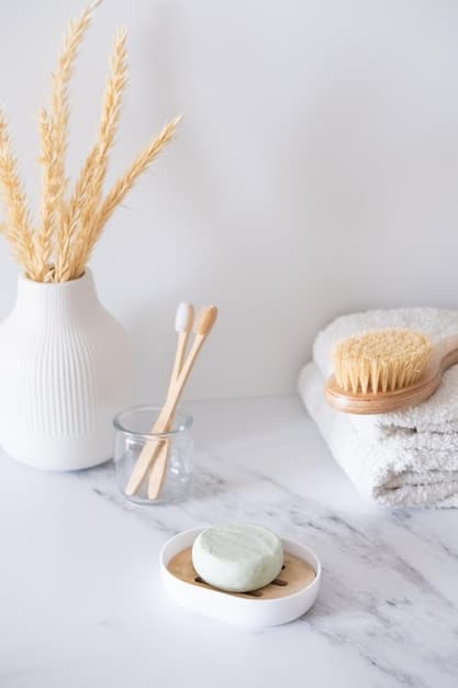 A calm and serene bathroom counter with a collection of gentle, fragrance-free skincare products arranged aesthetically around a small, soft towel.