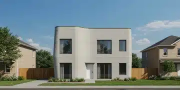 Modern 3D-printed home in a US suburban setting, showcasing innovative construction.