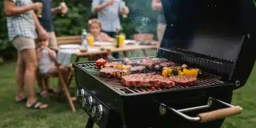Modern grill with sizzling food at a lively summer BBQ party